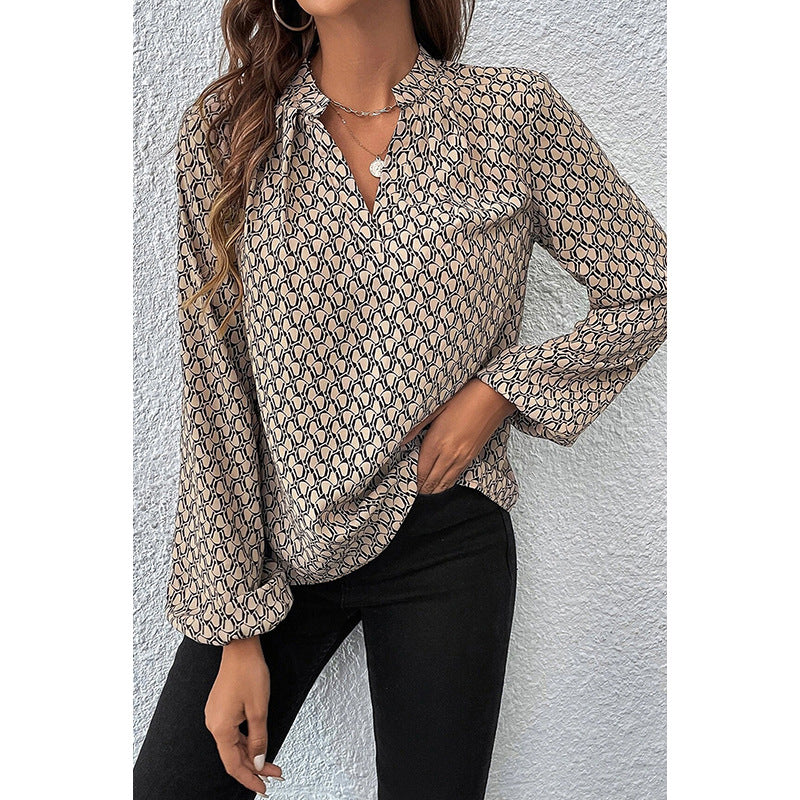 The “GeoVibe” V-Neck Blouse