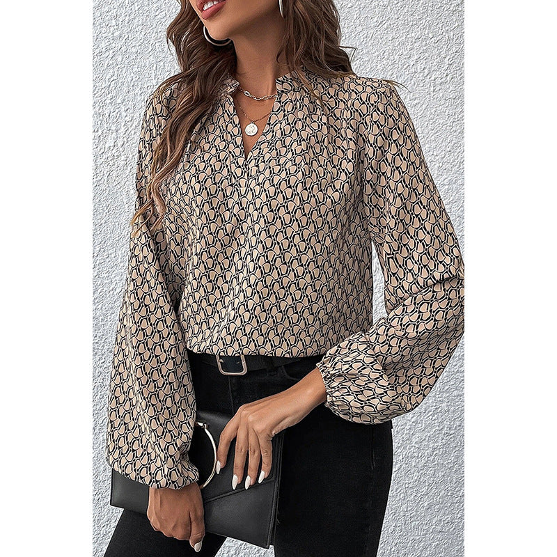 The “GeoVibe” V-Neck Blouse