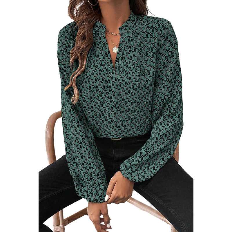 The “GeoVibe” V-Neck Blouse