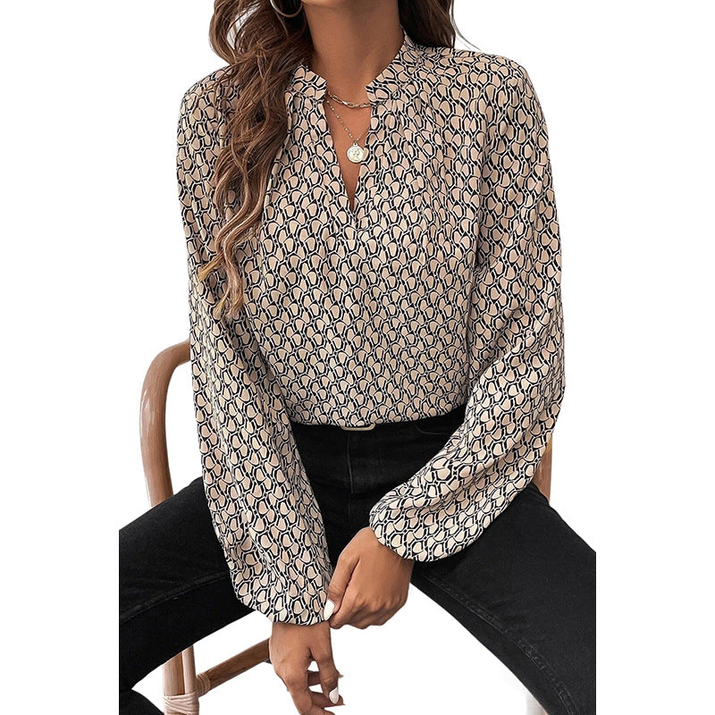 The “GeoVibe” V-Neck Blouse